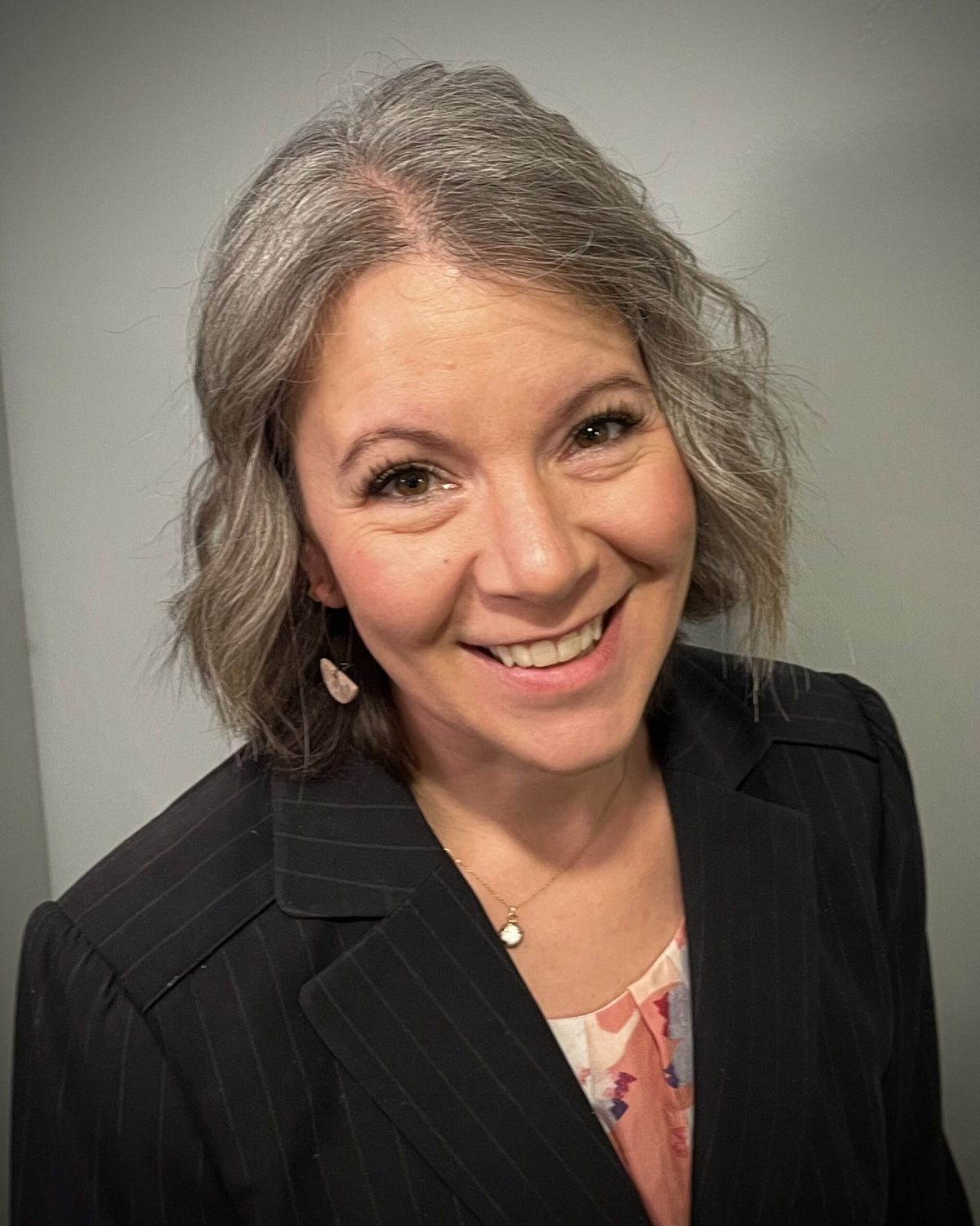 A picture of Kirsten Estep, the owner of Thrive Shenandoah Valley OMT. Kirsten is the primary provider of orofacial myofunctional therapy services.